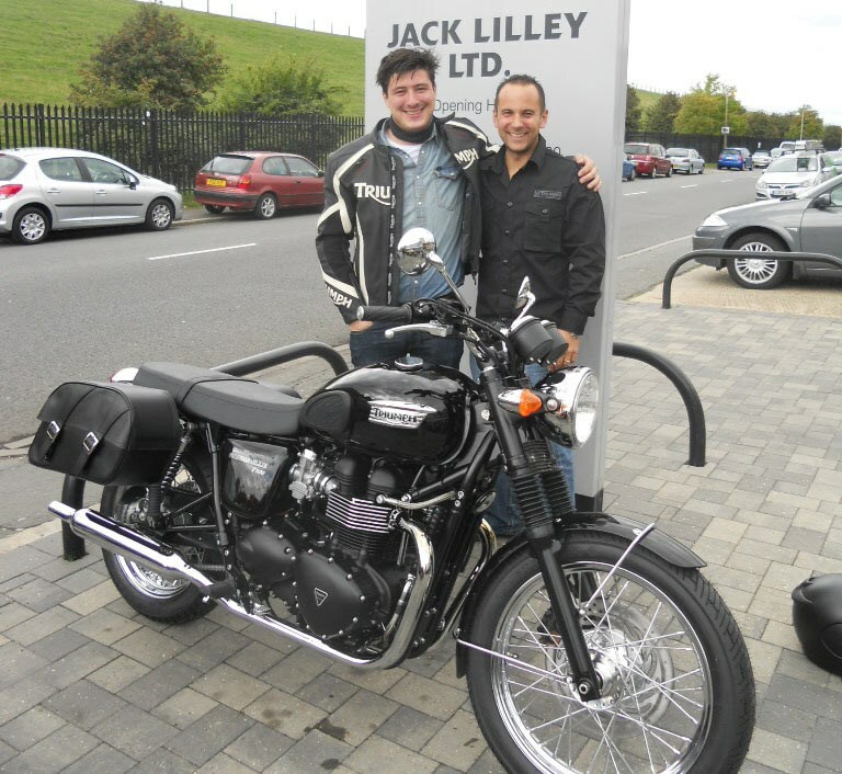 Marcus Mumford (Mumford and sons) collects a new triumph.jpg