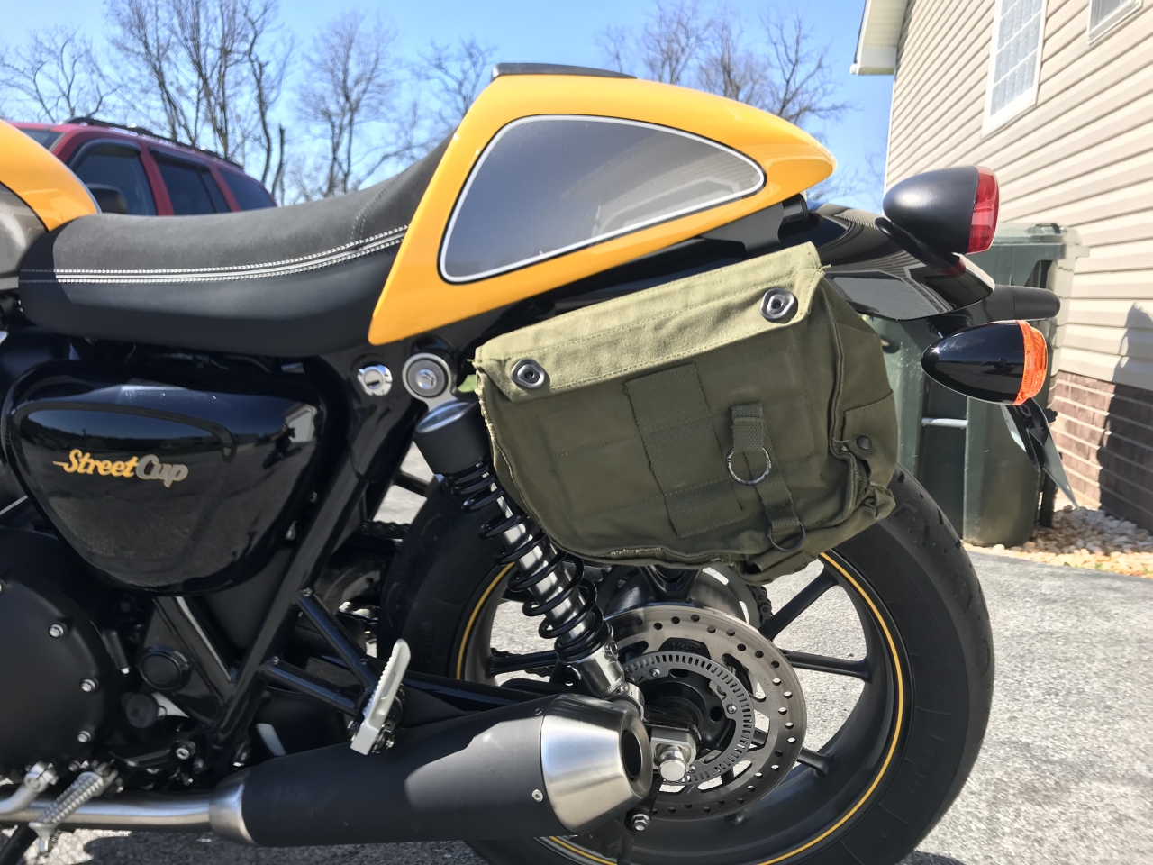 An old surplus military gas mask bag made a good pannier for knocking around town.