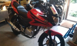 My first bike! Honda CBF125 in red XD great bike but nothing compared to my ST XD